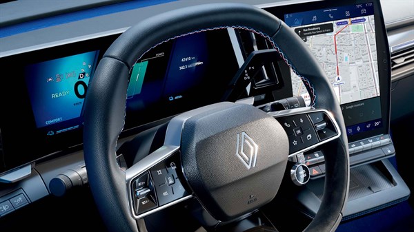 blue, white and red stitching on the steering wheel - Renault