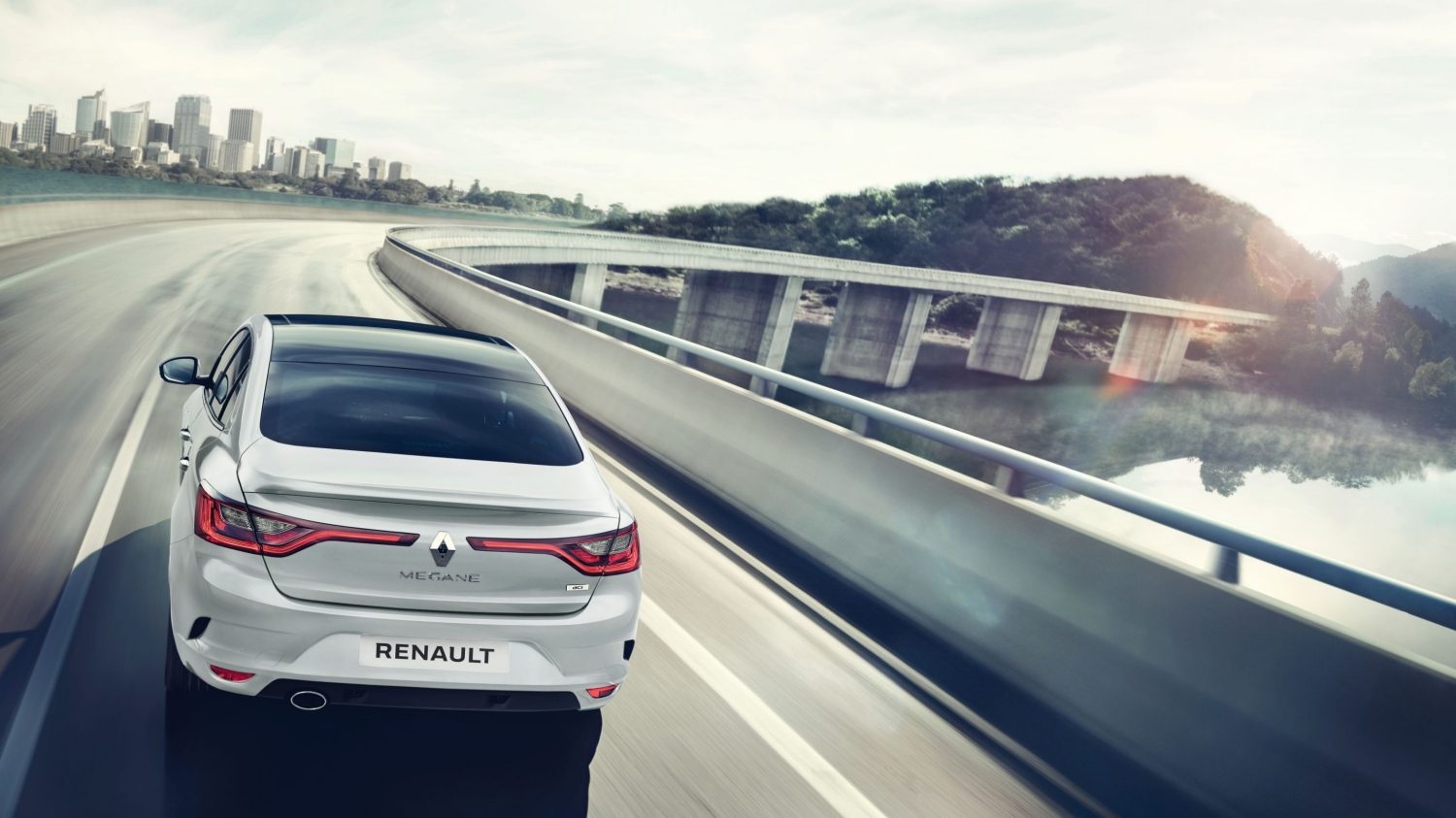 Renault Megane Sedan Rear End View on a Bend 