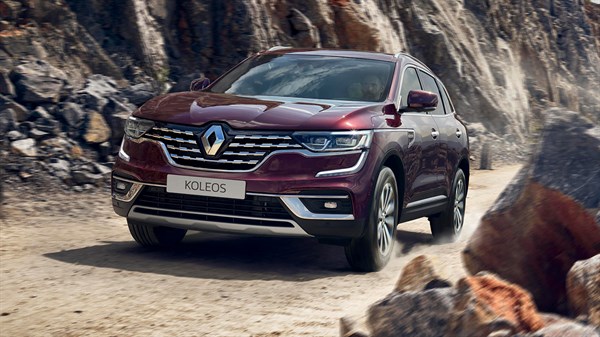 Renault KOLEOS climbing on a rocky hill